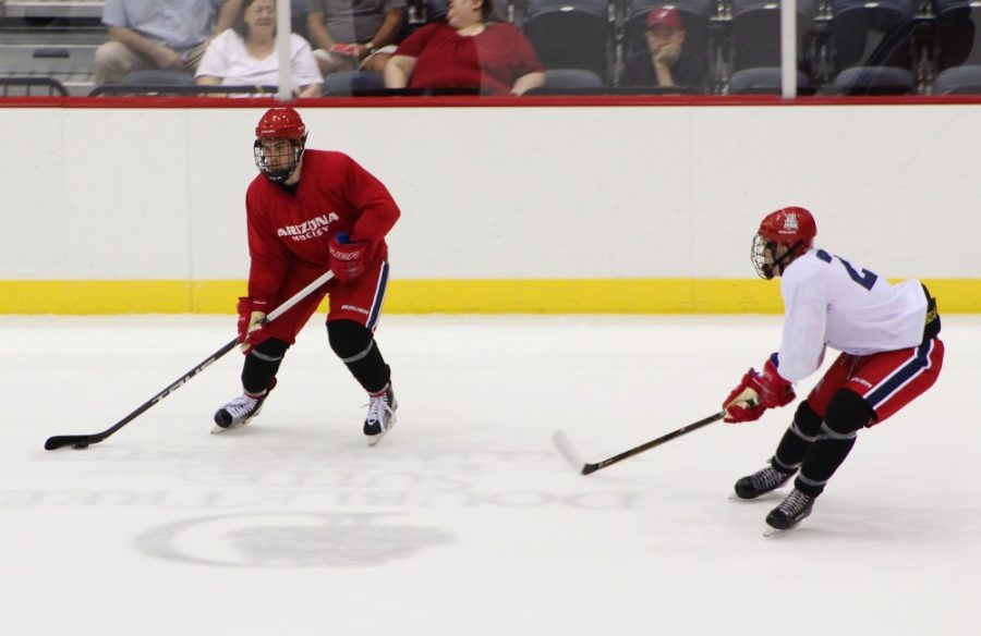 Arizona hockey players compete against each other in the game for the Media Day event on Sept. 28 at Tucson Arena.