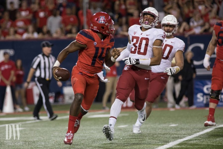 Arizona+Quarterback+Khalil+Tate+looks+for+a+teammate+to+pass+to+during+the+UA-Washington+State+game+on+Saturday%2C+October+28.