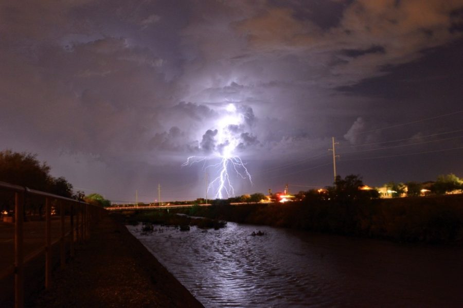 A lightning bolt illuminates the Tucson night sky during a monsoon thunderstorm on Aug. 11, 2014. 