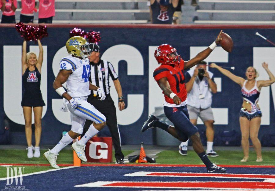 Arizona+quaterback+Khalil+Tate+%2814%29+celebrates+in+the+endzone+after+a+touchdown+during+the+UA-UCLA+game+on+Oct.+13+at+Arizona+Stadium.