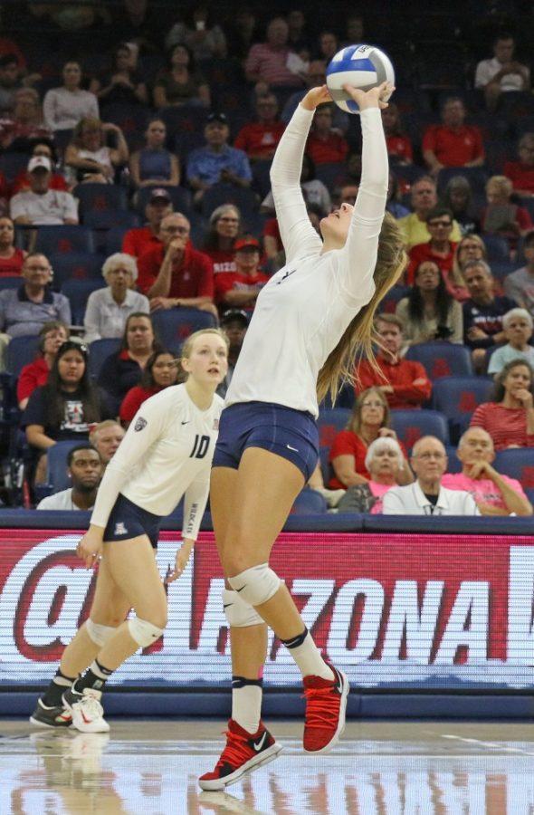 An+Arizona+volleyball+player+sets+the+ball+during+the+UA-Colorado+match+on+Oct.+15.
