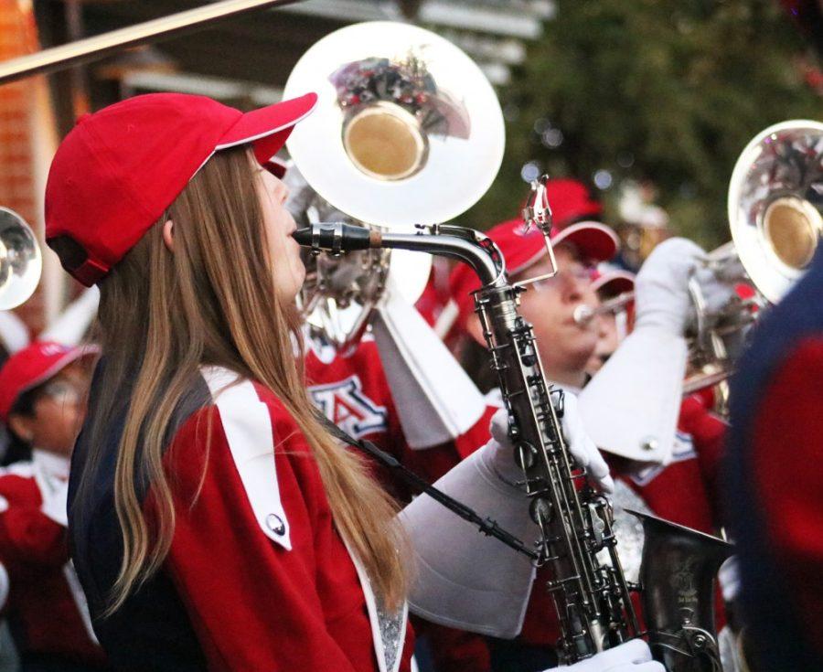A member of the Pride of Arizona marching band performs on Bear Down Friday during homecoming week on Oct. 27. 