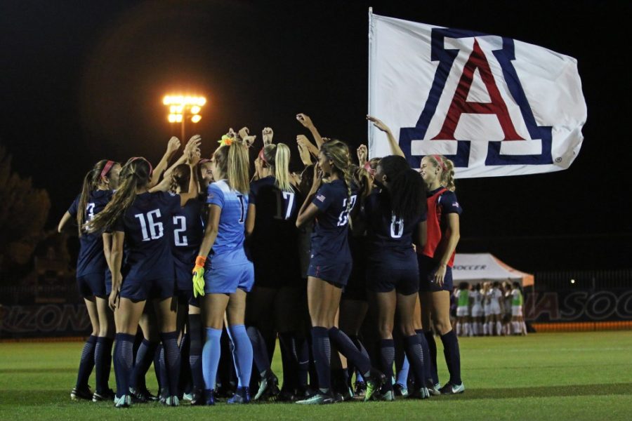 The+Arizona+soccer+team+huddles+together+before+their+game+against+Washington+on+Oct.+26.