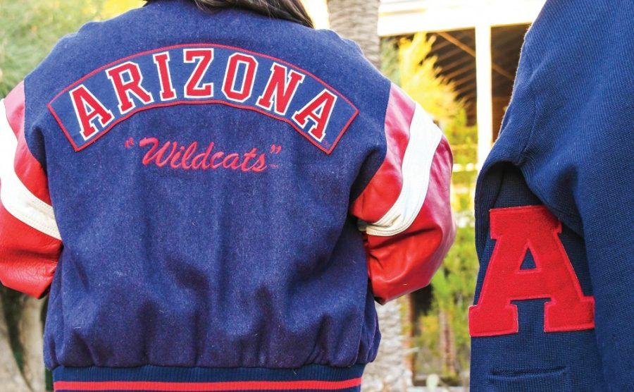 Two vintage University of Arizona letterman jackets. The jacket on the left is from UA alum Jasmine Lee and the one on the right is from Daniel Dempsey, whose grandfather was a UA football player. 