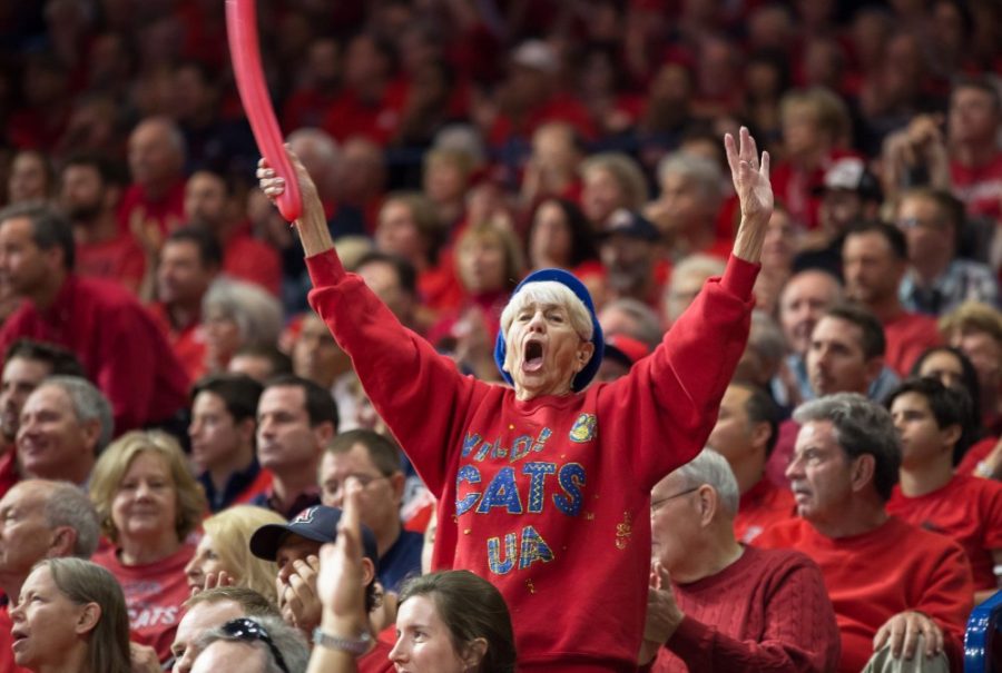 Phyllis Goodman cheers as UA scores against ASU on Jan. 12