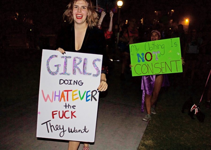 A protestor holds up their sign at the 2017 SlutWalk, an annual event that protests against rape culture and sexual harassment.