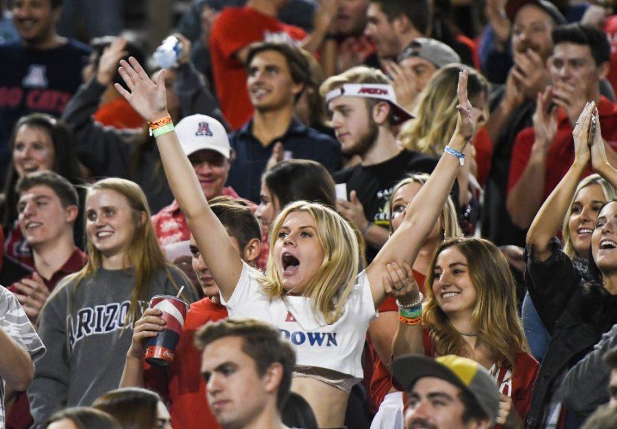 An Arizona fan in Zona Zoo reacts to a proposal during the UA-Oregon State game on Nov. 11 at Arizona Stadium.