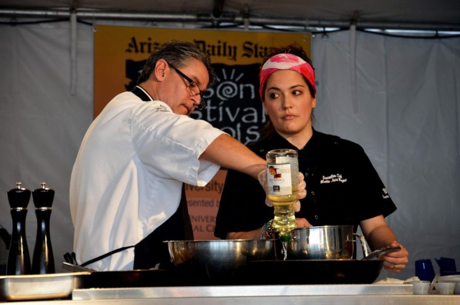 Chefs cook unique foods in front of an audience during the La Cocina Mexicana: Many Cultures, One Cuisine show at the Tucson Festival of Books.