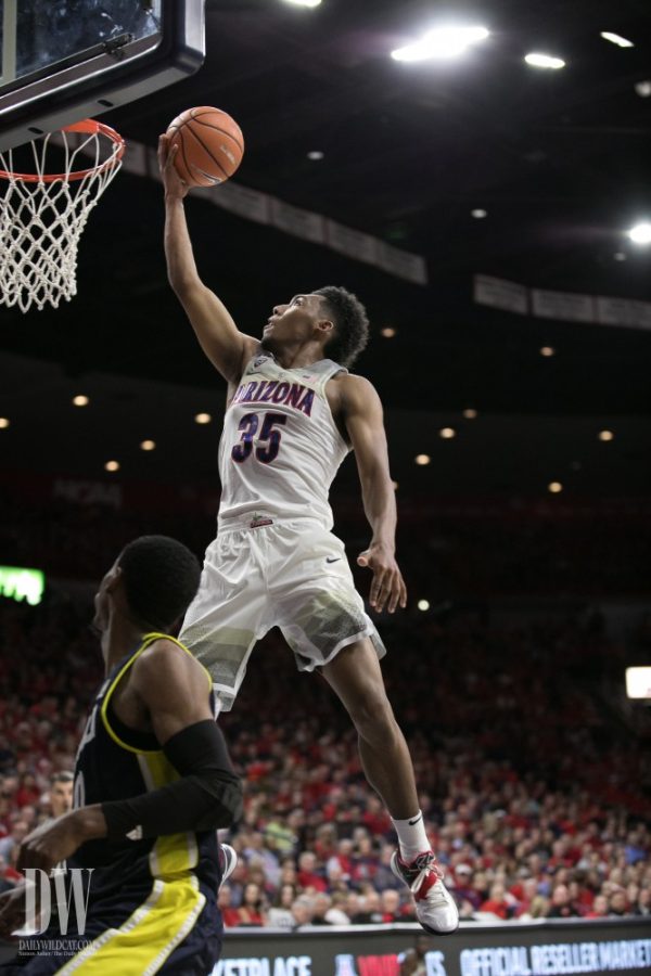 Arizonas+Allonzo+Trier+jumps+to+lay+in+the+ball+during+the+UA-NAU+opening+game.+Trier+lead+the+Wildcats+in+scoring+with+32.%26nbsp%3B