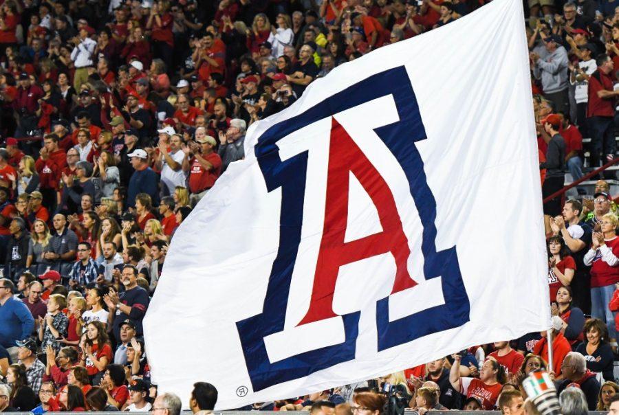 The+A+flag+is+held+up+by+Arizona+cheerleaders+during+the+UA-Oregon+State+game+on+Nov.+11+at+Arizona+Stadium.
