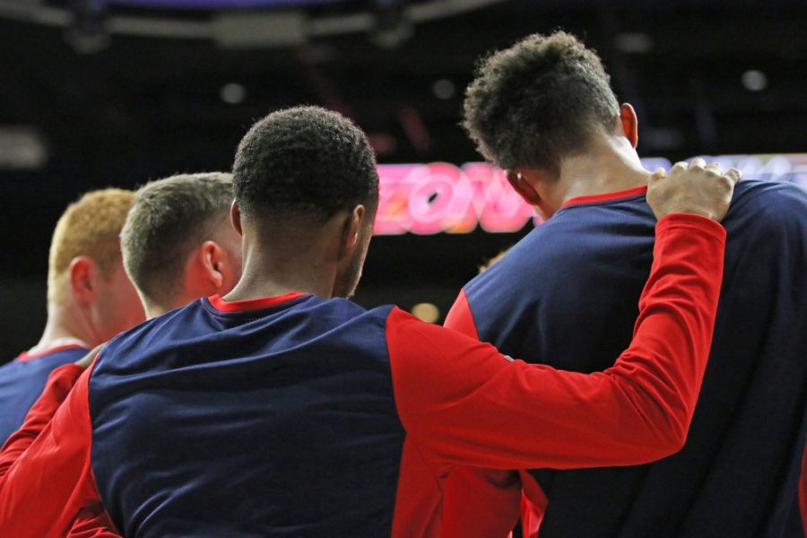 The+University+of+Arizona+mens+basketball+team+huddles+together+before+their+game+against+Eastern+New+Mexico+on+Nov.+1+in+McKale+Center.+Arizona+dropped+three+games+while+in+Paradise+Islands%2C+Bahamas+for+the+Battle+4+Atlantis+Tournament.