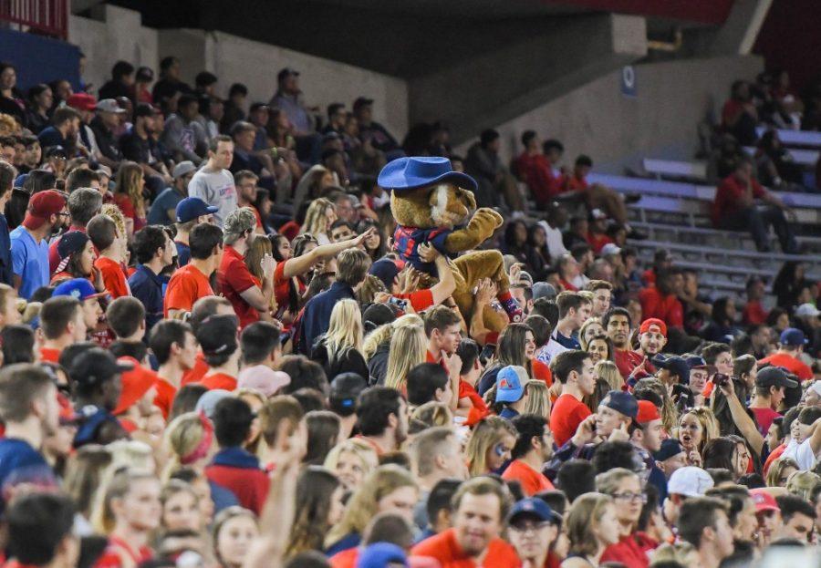 Wilbur Wildcat crowd surfs during the UA-Oregon State game on Nov. 11 at Arizona Stadium.
