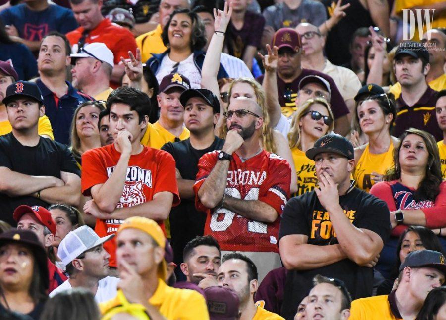 Arizona fans tensely watch the UA-ASU territorial cup game just before Arizona State scored a touchdown.