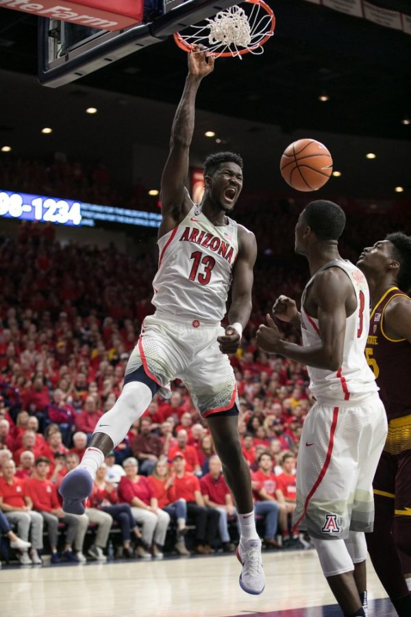 Arizonas Deandre Ayton powers the ball down against Arizona State. Ayton had 23 points and 19 rebounds in the game.