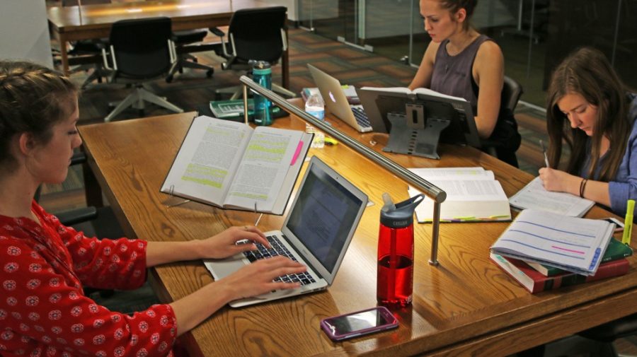First year law students, Rachel Lopez, Allie Whitehill and Kelly Mull study at the Daniel F. Cracchiolo law library on Nov. 8.