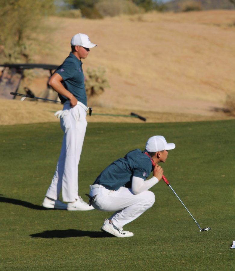 Trevor Werbylo (left) and Tianlang Guan (right) at the Arizona Intercollegiate golf Tournament on Jan. 29, 2018 at Sewailo golf course.