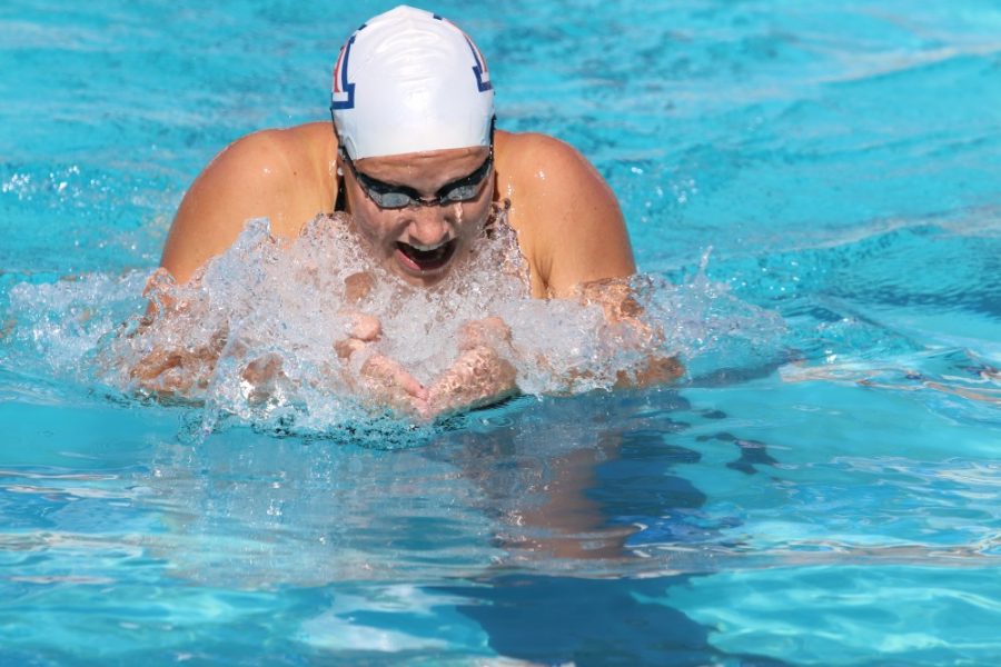 Arizonas Hannah Cox, sophomore, swims the breaststroke portion of the 400 individual medley during this Saturdays meet.