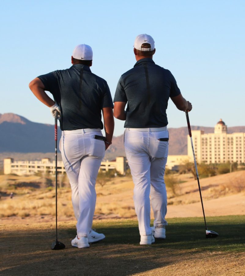David Laskin (left) and Brad Reeves (right) stand together at Sewailo golf course during the Arizona Intercollegiate Golf Tournament on Jan. 29, 2018.