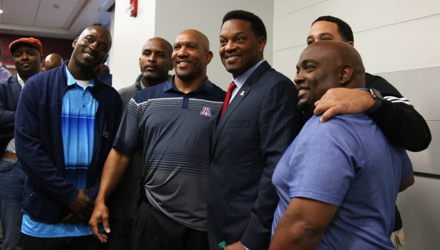 Kevin Sumlin was introduced Tuesday, Jan. 16 as the UAs next head football coach. Sumlin, who was let go by Texas A&M in December, poses with past UA football players