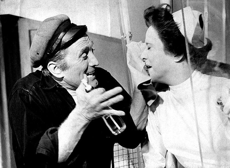 Publicity photo of Kirk Douglas and Joan Tetzel in stage play, One Flew Over the Cuckooss Nest.
