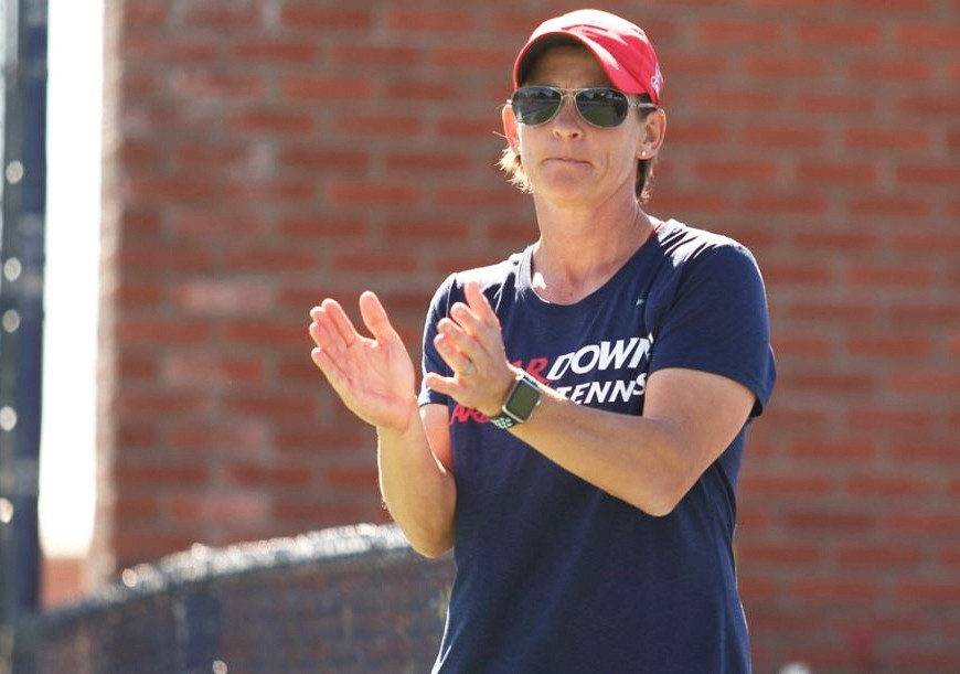 Women’s tennis head coach Vicky Maes claps during the Arizona-Nevada match on Friday Feb. 9 at Lanelle Robson Tennis Center in Tucson, Ariz.