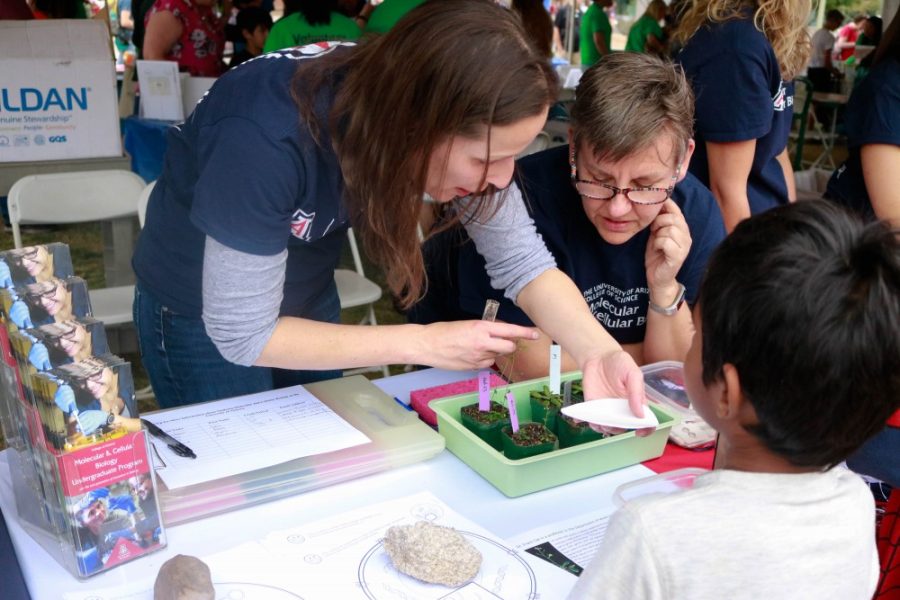 Volunteers+encourage+children+and+their+families+to+interact+with+the+many+exhibits++as+part+of+the+science+city+experience+at+the+tenth+annual+Tucson+Festival+of+Books+on+Saturday+March+10.