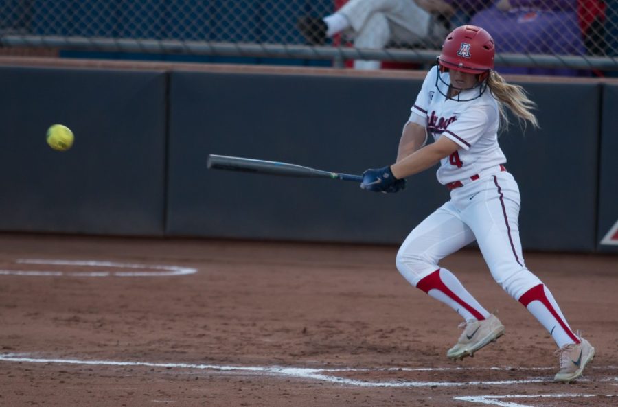 Arizonas Carli Campbell (4) hits an incoming ball from Cal during the Arizona- California  game at Rita Hillenbrand Memorial Stadium on Thursday March 29 in Tucson Ariz.