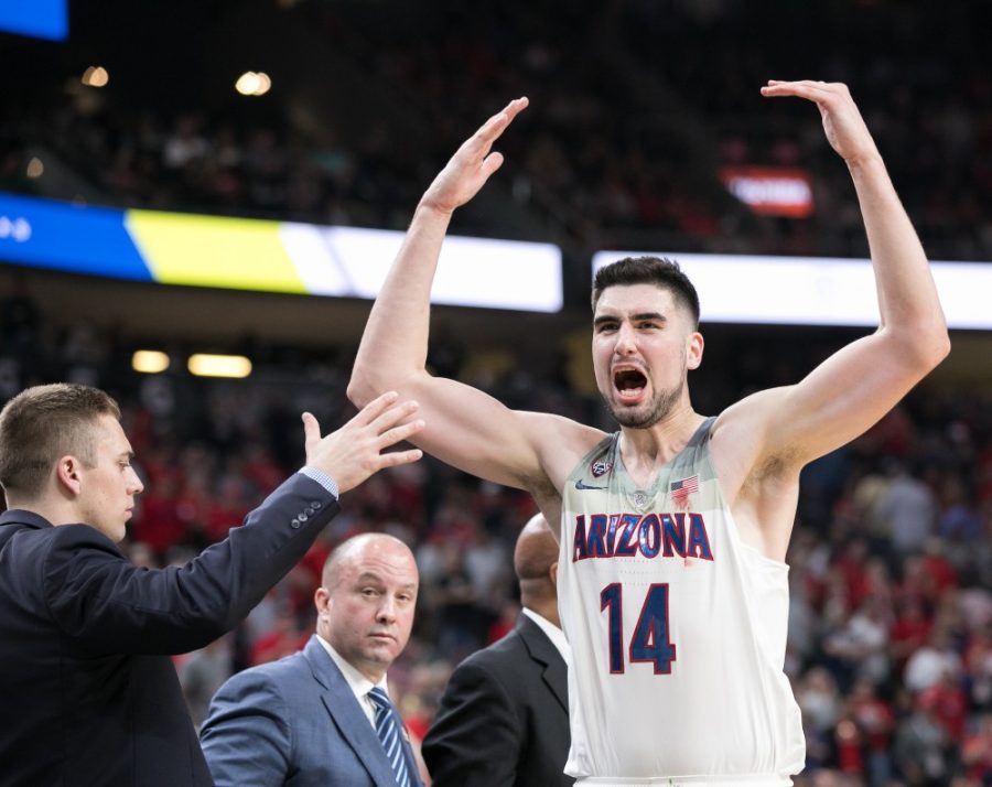 Arizonas Dusan Ristic pumps up the crowd in Las Vegas as he checks back onto the bench in the final minutes of the Arizona-USC Championship game at the 2018 Pac-12 Tournament on Saturday, March 10 in T-Mobile Arena in Las Vegas, Nev.