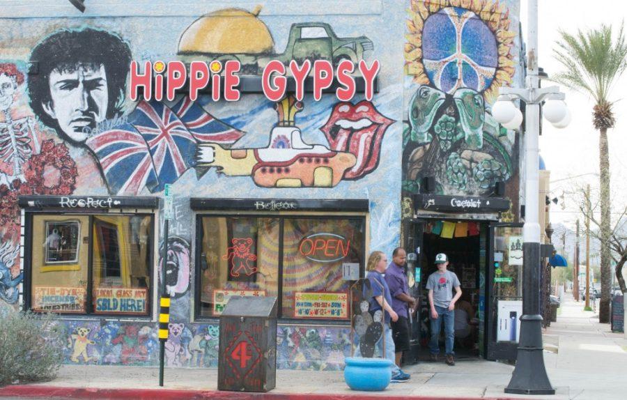 Customers walk out of the Hippie Gypsy, a store located on 4th ave in Tucson, on March 13.