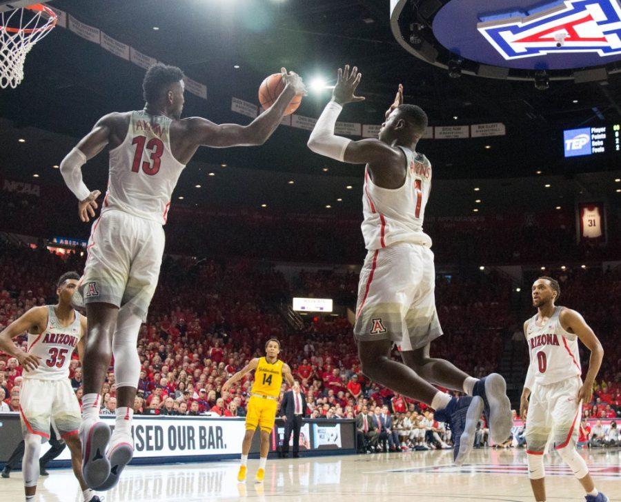 Arizonas+Deandre+Ayton+%2813%29+snatches+the+ball+from+the+air+after+a+missed+shot+by+the+California+team+during+the+Arizona-California+game+on+Saturday+March+3+at+McKale+Center