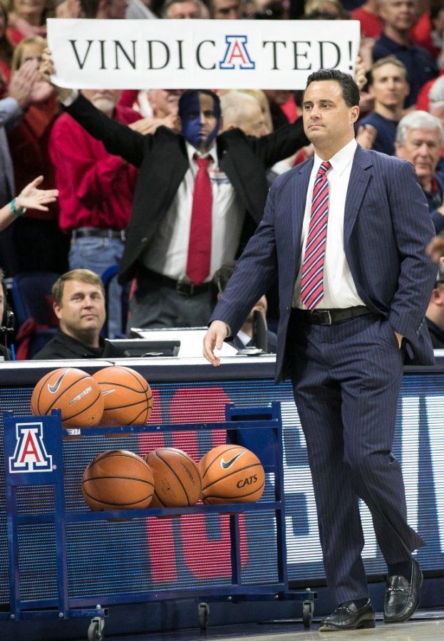 Sean+Miller+walks+by+a+supporter+before+the+Arizona-Stanford+game+on+Thursday%2C+March+1+at+McKale+Center+in+Tucson%2C+Ariz.