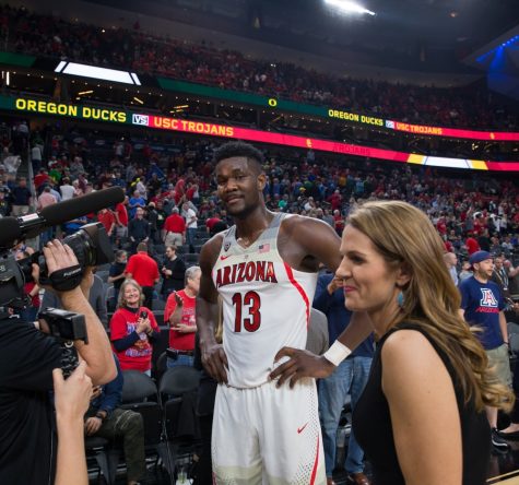 Arizona's Deandre Ayton cools off with an interview with the Pac-12 Network after overtime in the Arizona-UCLA Semifinal game at the 2018 Pac-12 Tournament on Friday, March 9 in T-Mobile Arena in Las Vegas, Nev.