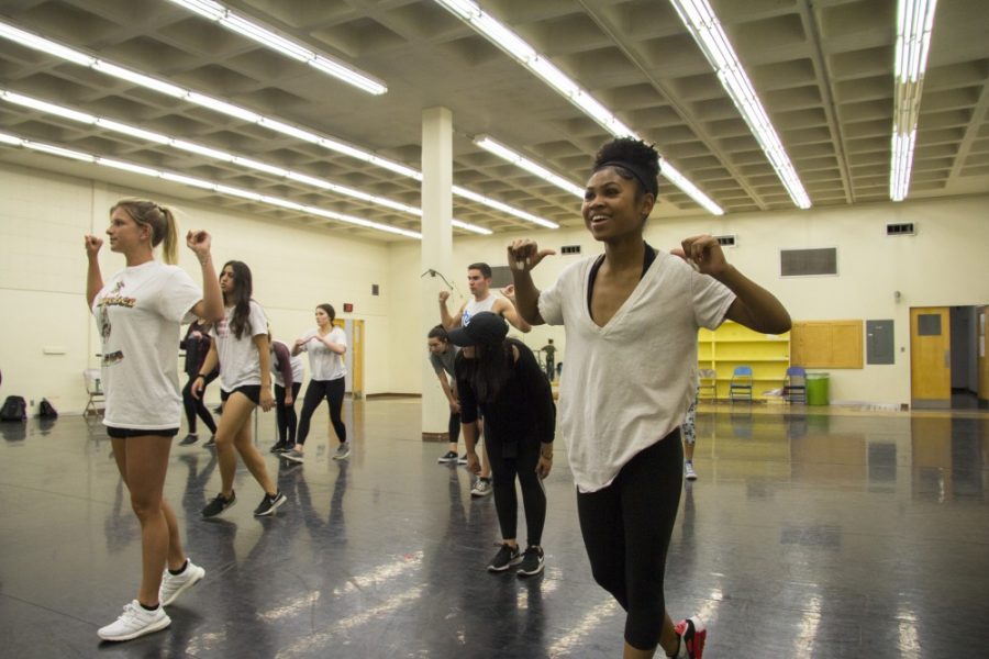 Black and Blue Hip Hop Dance crew practice their dance routine in front of a mirror at Gittings building on April 12.