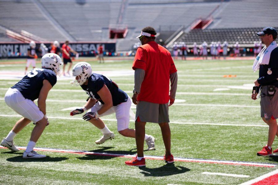 Arizona+head+coach+Kevin+Sumlin%2C+center%2C+watches+two+players+doing+drills+before+a+team+scrimmage+in+the+spring+football+season+on+Saturday+April+7%2C+in+Arizona+Stadium+in+Tucson%2C+Ariz.