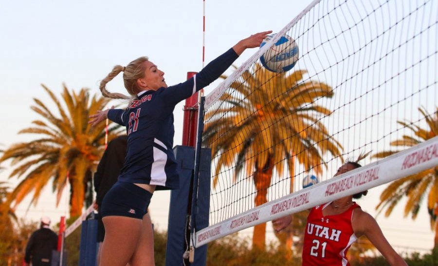 Arizona%26%238217%3Bs+Kacey+Nady+%2821%29+spikes+the+ball+over+the+net+during+the+Arizona-Utah+beach+volleyball+game+at+Bear+Down+Beach%2C+in+Tucson+Ariz.+on+Friday+April+20.