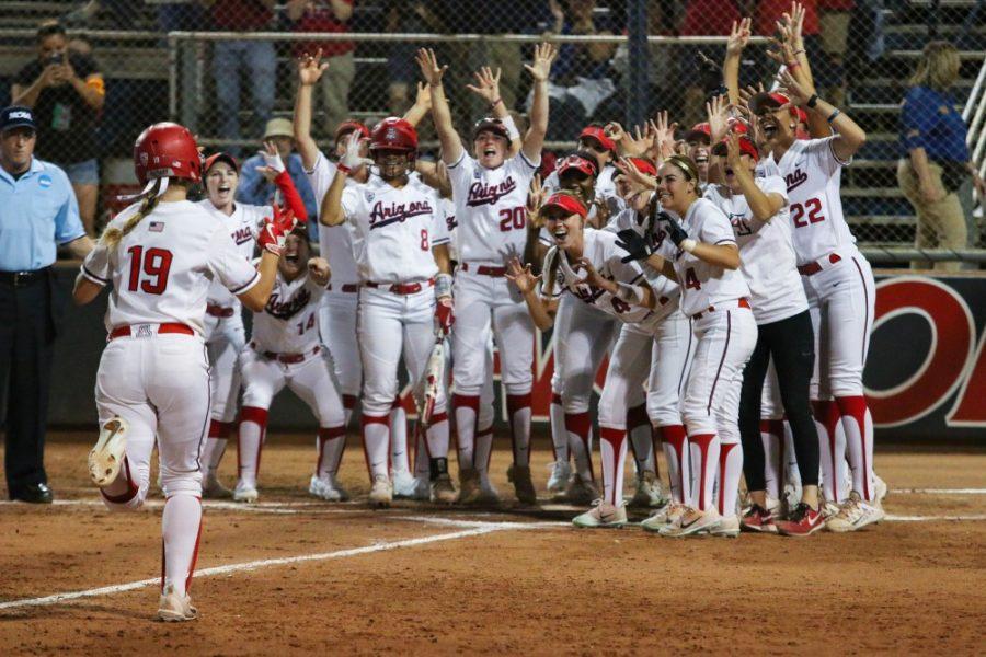 Arizonas+Jessie+Harper+%2819%29+runs+towards+home+plate+after+hitting+a+home+run+during+the+fourth+inning+of+the+Arizona-St.+Francis+game+of+the+NCAA+championship+Tournament+on+Friday+May+18+at+the+Rita+Hillenbrand+Stadium+in+Tucson%2C+Ariz.+The+run+scores+the+cats+the+first+point+of+the+game.