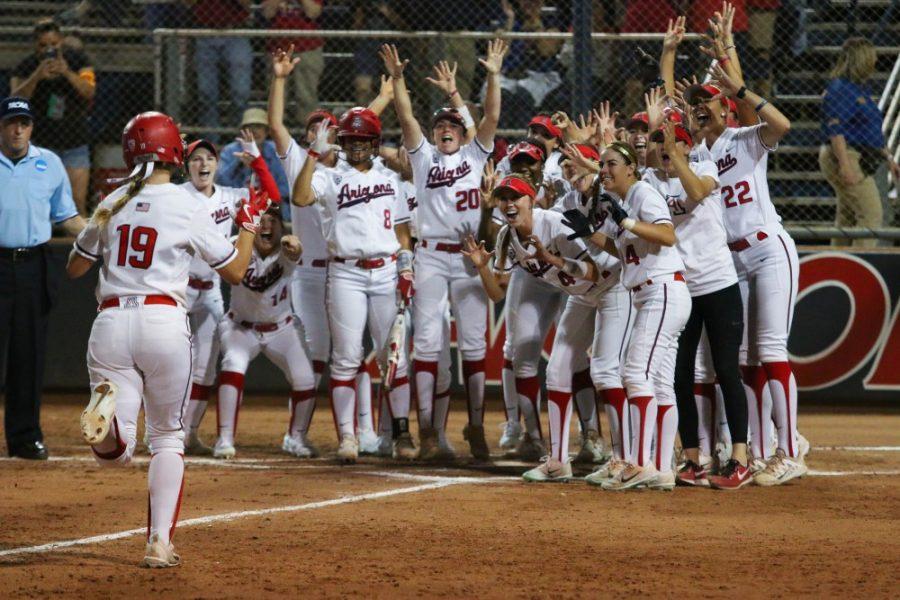 Arizonas+Jessie+Harper+%2819%29+runs+towards+home+plate+after+hitting+a+home+run+during+the+fourth+inning+of+the+Arizona-St.+Francis+game+of+the+NCAA+championship+Tournament+on+Friday+May+18+at+the+Rita+Hillenbrand+Stadium+in+Tucson%2C+Ariz.+The+run+scored+the+cats+the+first+and+only+point+of+the+game.