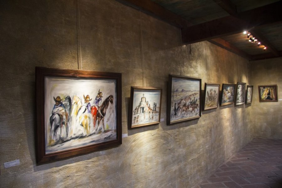 Ettore Ted DeGrazia paintings are seen hanging in his gallery that has been open since 1965. 
