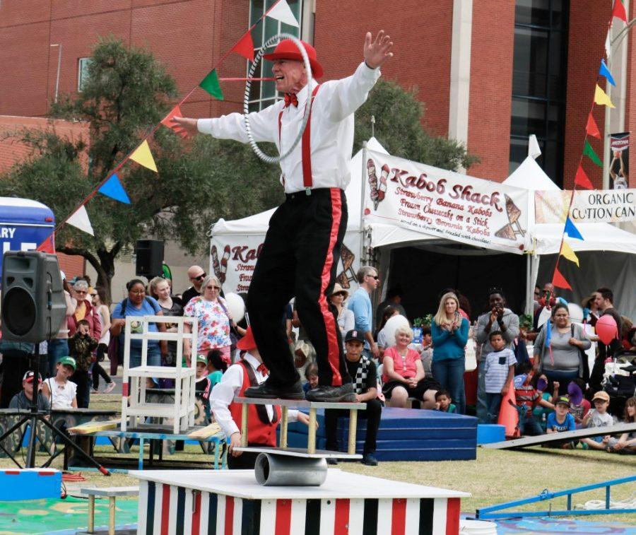 A circus-themed act performs at the tenth annual Tucson Festival of Books on Saturday March 10. The festival has more than just books and provided entertaining performances for children all day.