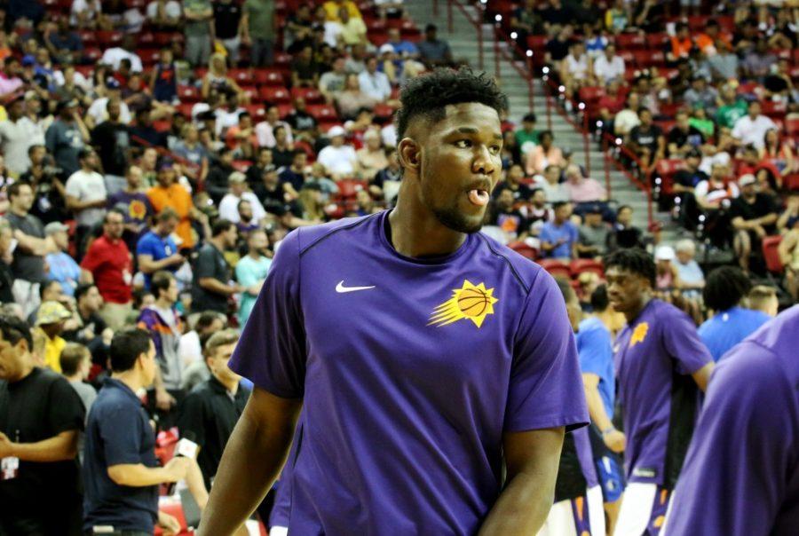 Phoenix Suns center Deandre Ayton warms up on the court prior to his NBA Summer League debut versus the Dallas Mavericks on July 6, 2018, at the Thomas & Mack Center in Las Vegas, Nev.