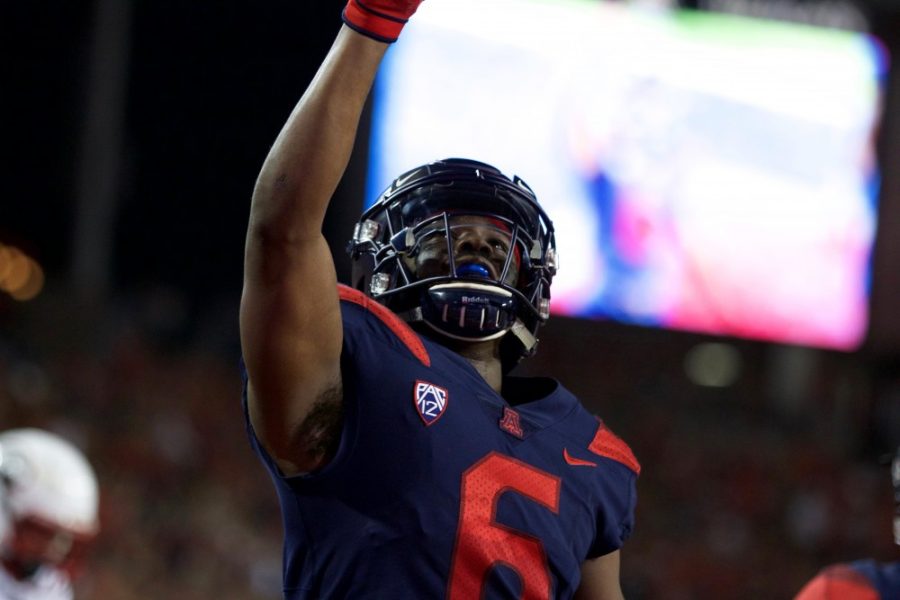 Shun Brown celebrates after scoring a third touchdown for Arizona during the second quarter of the Arizona vs. Southern Utah game. The score at the end of the first half was 24-17 with Arizona in the lead 