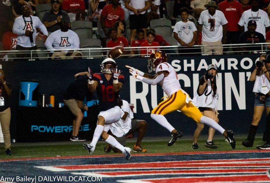 Arizona+wide+receiver+Cedric+Peterson+%2818%29+catches+the+incoming+throw+from+Kahlil+Tate+%2814%29+in+the+Arizona-USC+game+at+the+Arizona+Stadium+on+Saturday+September+29%2C+2018+in+Tucson%2C+Az.