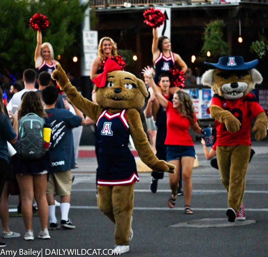 Wilbur and Wilma lead the parade down University Blvd during Bear Down Friday on September 28, 2018 in Tucson, Az.
