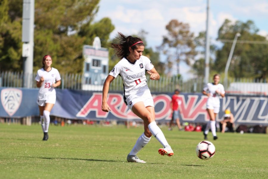 Arizonas junior defender Morgan Mcgarry passes the ball up to the forwards during the game against Washington State on Sunday, Oct 21 at Mulcahy Stadium. The final score was a 2-1 win for the wildcats.  