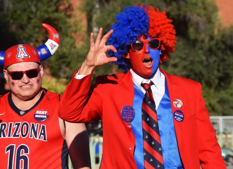 A Wildcats fan walking in the parade for the homecoming celebration on the University of Arizona Mall on October 27. This year’s homecoming game was against Oregon.