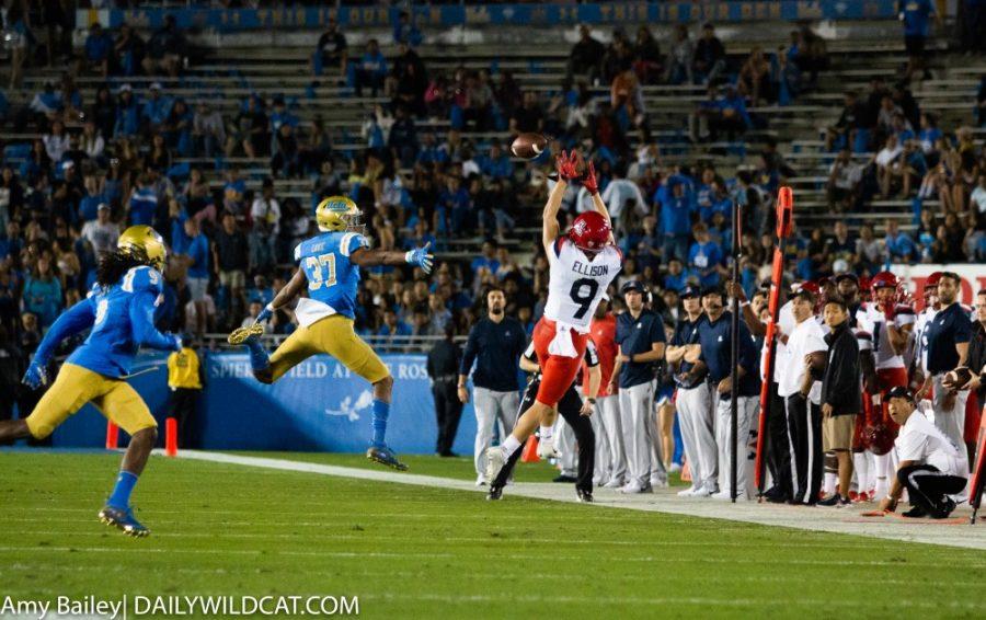 Wildcat Tony Ellison (9) jumps to catch the incoming ball from Rodriguez (4) during the Arizona-UCLA game at Spieker Field on Oct. 20, 2018 at the Rose Bowl in Pasadena, CA.