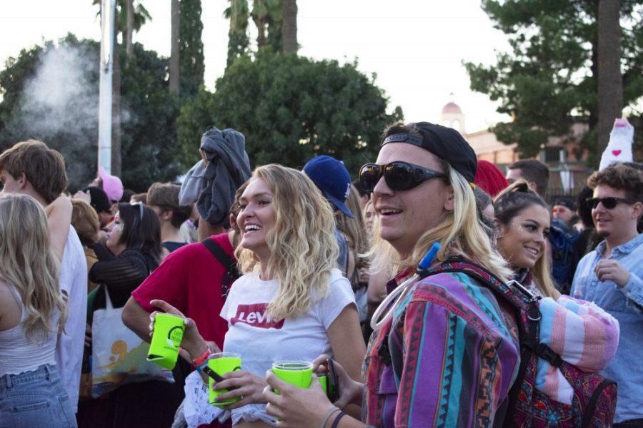 Two people enjoy drinks and listening to the music at last years Dusk music festival in downtown Tucson, AZ on Saturday, Nov. 10, 2018. Local Food vendors can be found at the festival as well as many spots to get drinks or whatever youre craving.