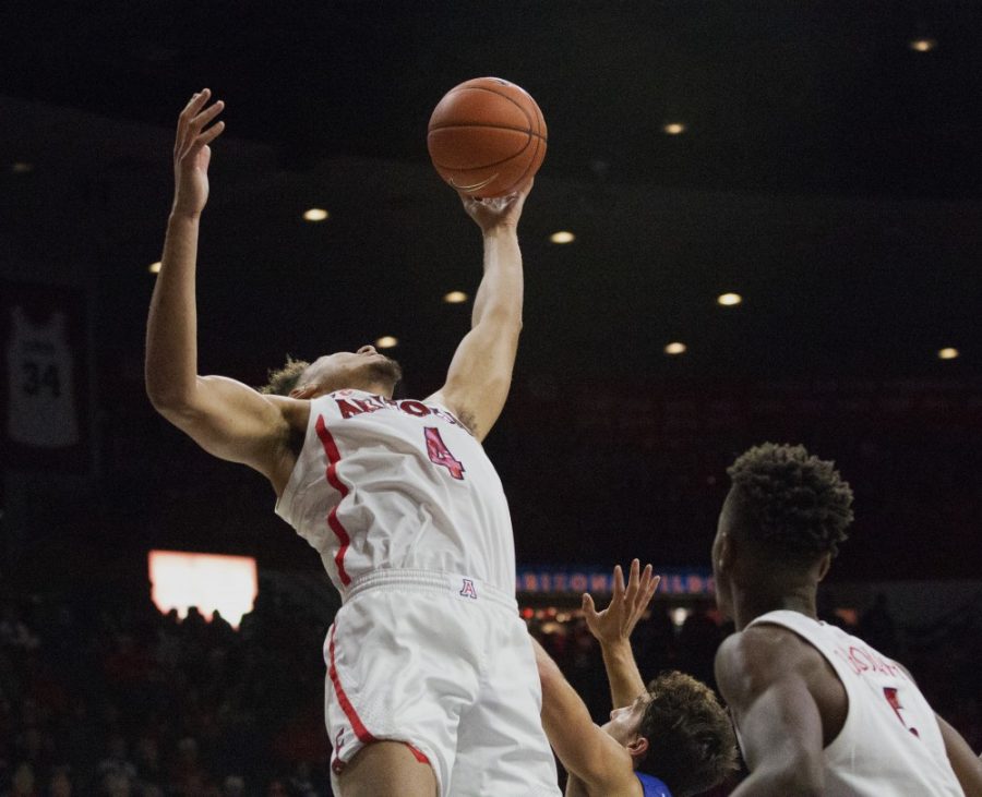 Wildcat Chase Jeter (4) jumps to grab the ball during the second half of the Arizona -Houston Baptist game at McKale Stadium on Nov.7, 2018 in Tucson, Az. Wildcats won 90-60.