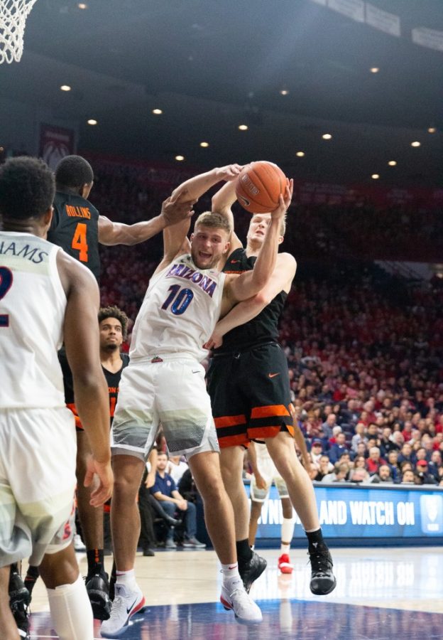 Forward Ryan Luther (10) catches a rebound ball during the game against Oregon State University on Saturday, Jan. 19 at McKale Center. Arizona beat OSU 82-71. 