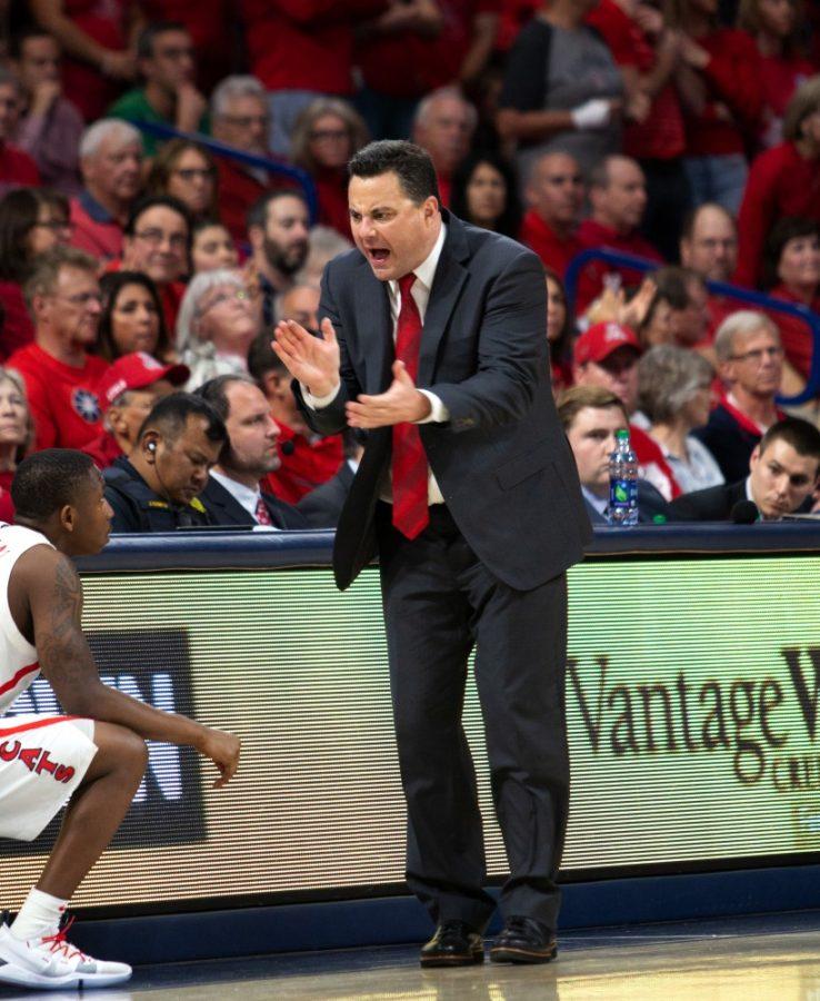 Sean Miller encourages Justin Coleman (12) during the Arizona-Oregon game on Thursday Jan. 17 at McKale Center in Tucson Ariz.  The game ended Oregon 59 and Arizona 54.